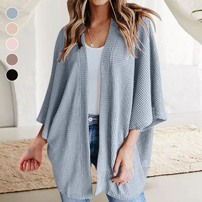 3/4-sleeved knitted cardigan for everyday wear or home use