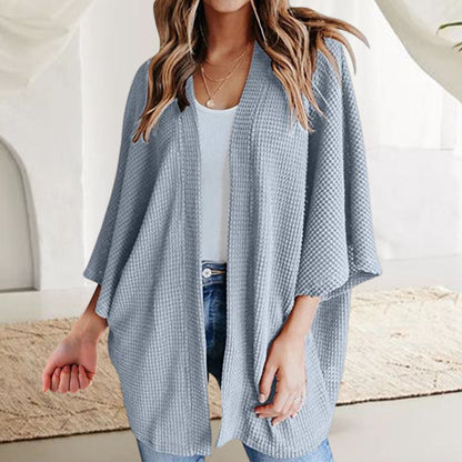 3/4-sleeved knitted cardigan for everyday wear or home use