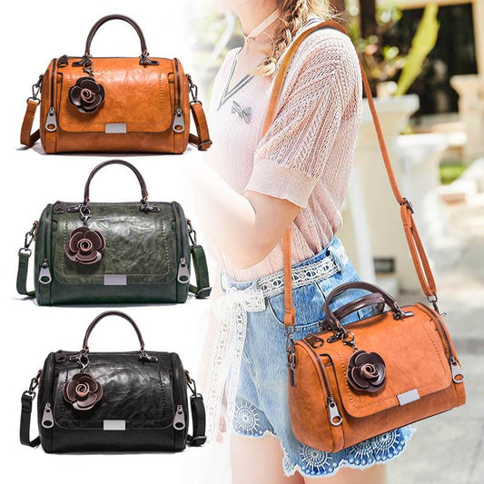 Versatile cowhide bag with flower decoration