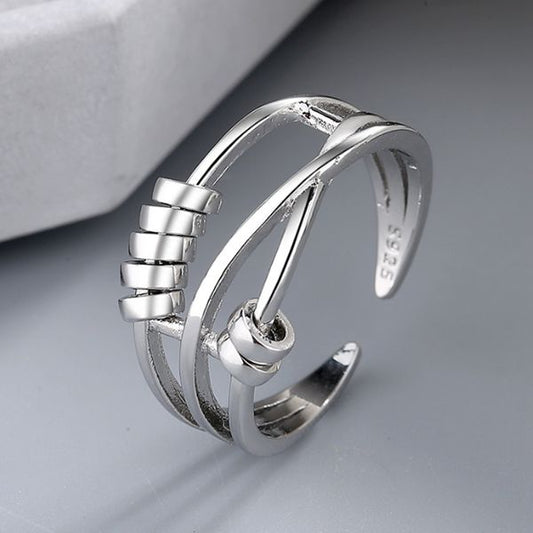 Anxiety reducing ring with spinners