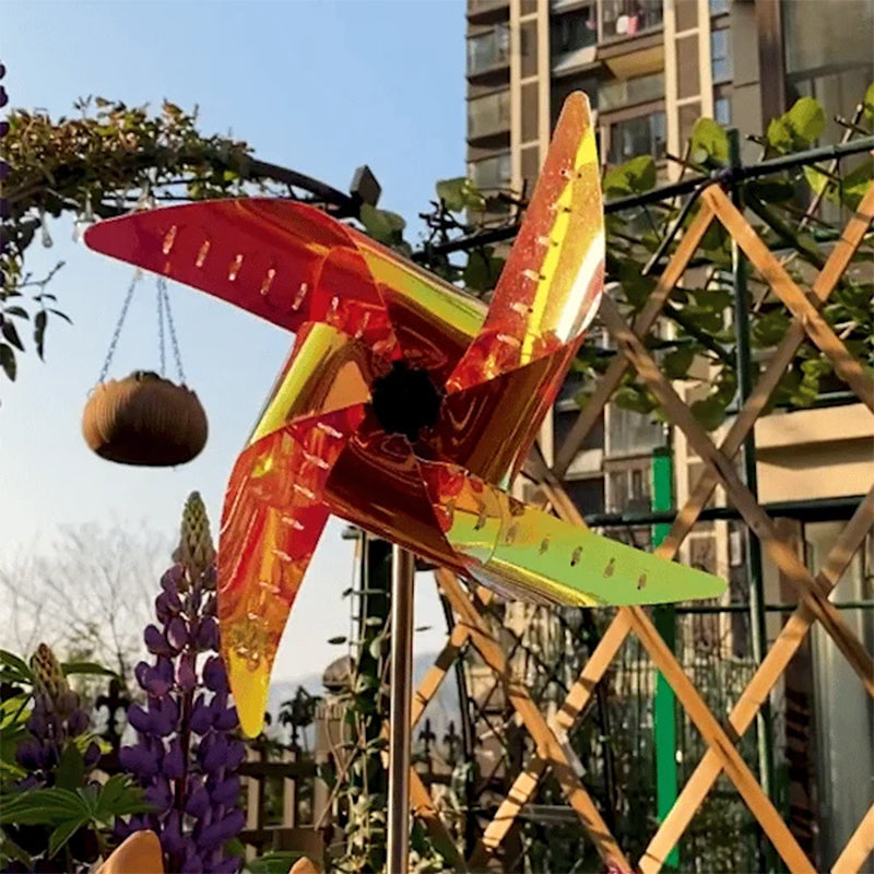 Colorful solar powered windmill light for the garden