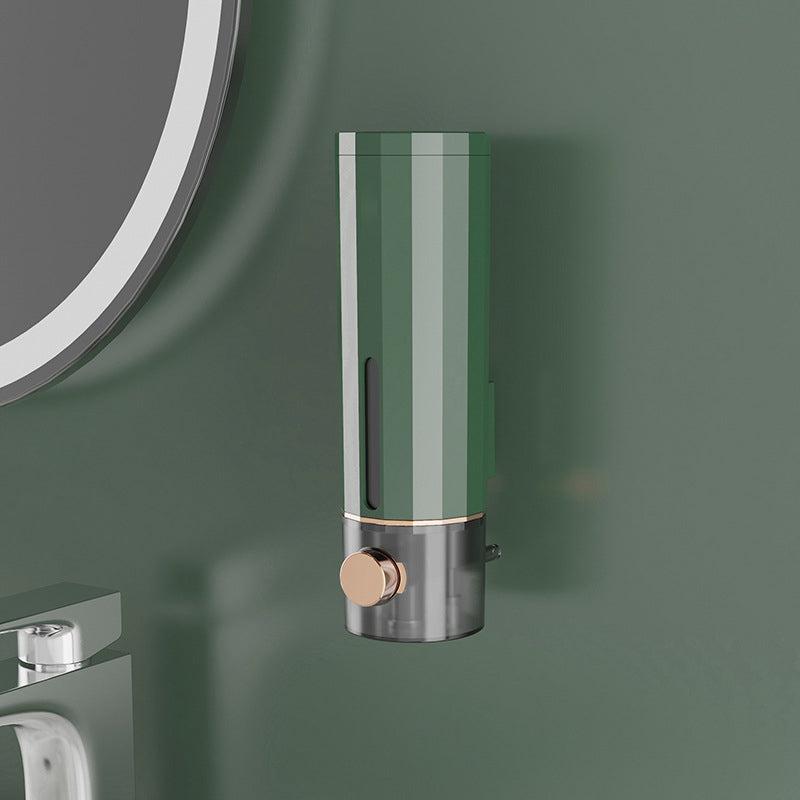 Manual soap dispenser for wall mounting