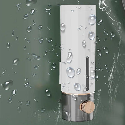 Manual soap dispenser for wall mounting