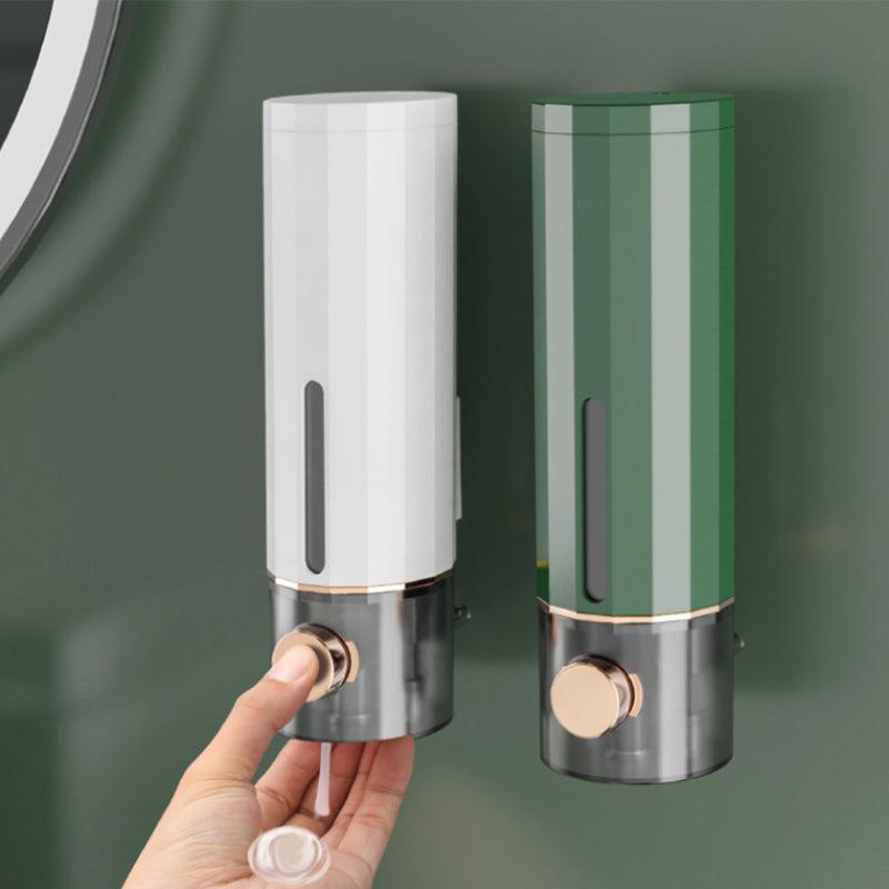 Manual soap dispenser for wall mounting