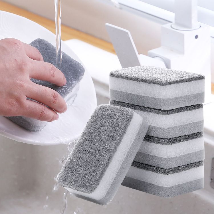 Cleaning sponge in neutral colours