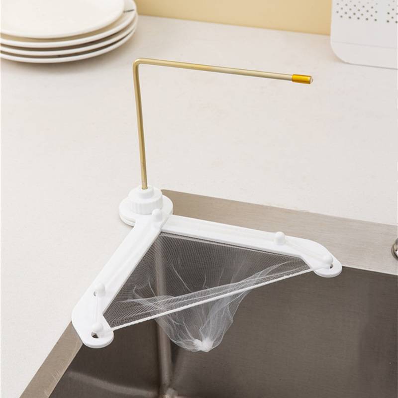 Washbasin strainer with kitchen towel hanger