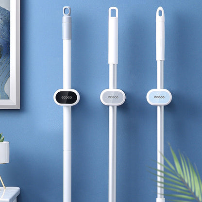 Wall-mounted holder for mops and brooms - keep things organized